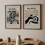Set of 2 abstract flower posters arranged as gallery wall in modern interior