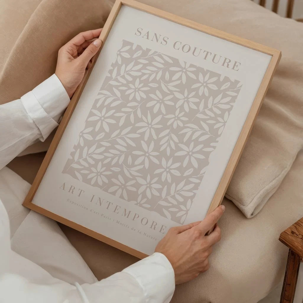Beige botanical floral poster styled in minimalist bedroom with neutral decor