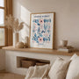 Blue flowers watercolor poster styled in elegant bedroom with soft romantic decor