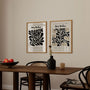 Set of 2 graphic botanical posters styled in modern office with minimalist decor