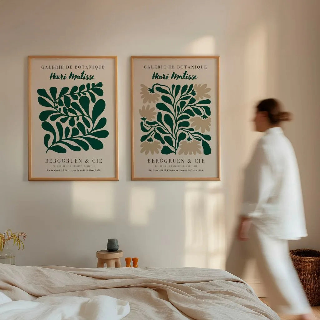 Set of 2 abstract green leaf posters arranged as gallery wall in bright modern interior