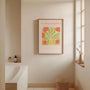 Orange tulips in vase poster displayed in gallery wall with floral artwork