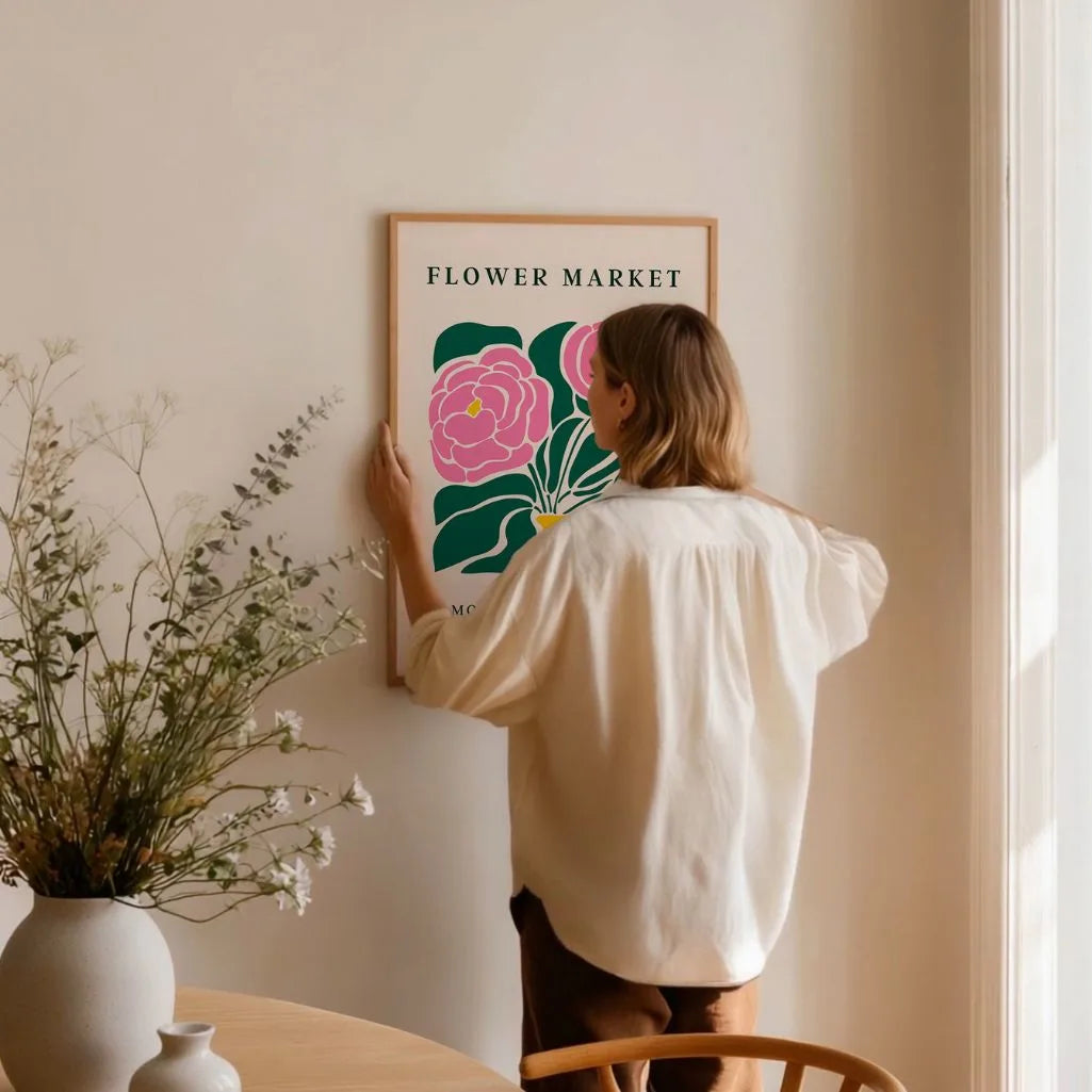 Pink peonies poster styled in modern living room with vintage decor