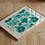 Teal flower poster displayed in gallery wall with modern floral artwork