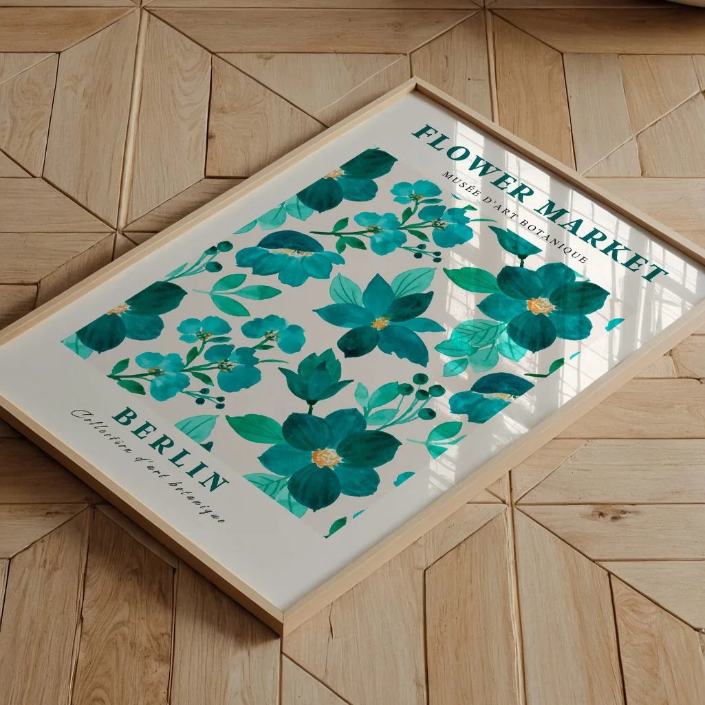 Teal flower poster displayed in gallery wall with modern floral artwork