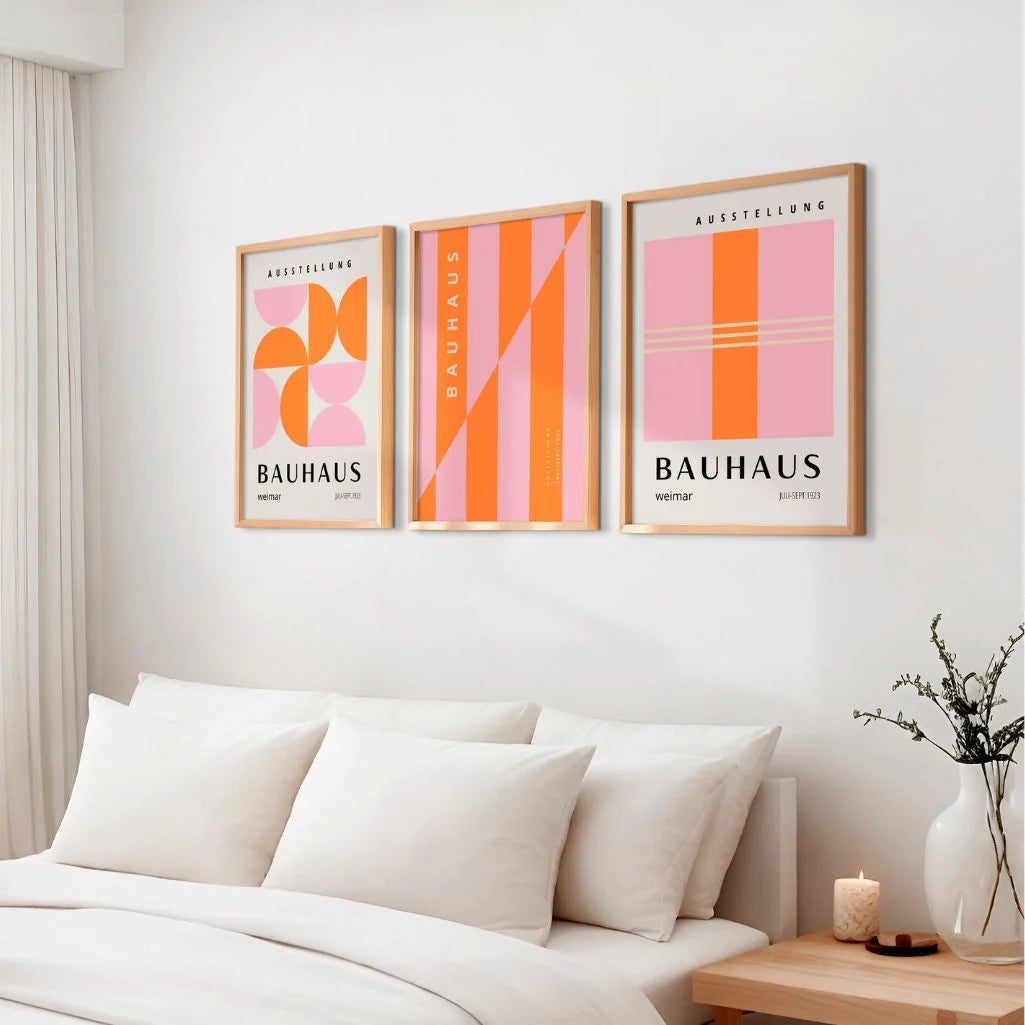 pink and orange bauhaus poster set of 3 arranged in modern gallery wall