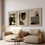 green olive and beige geometric bauhaus poster set in contemporary office